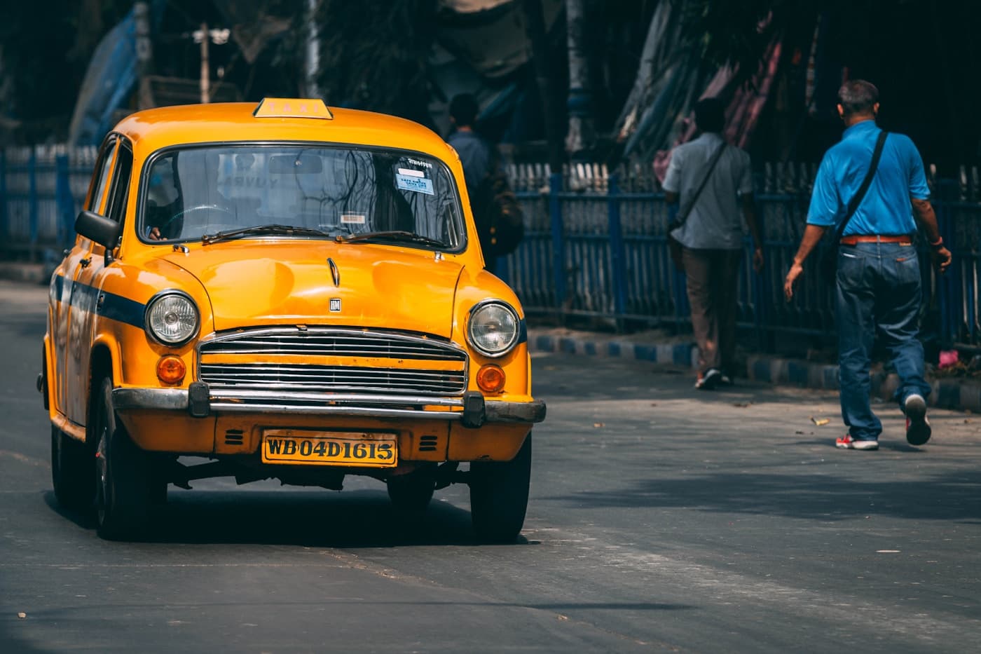 Local taxi service in Chennai — yellow Ambassador and Indian city cab booking